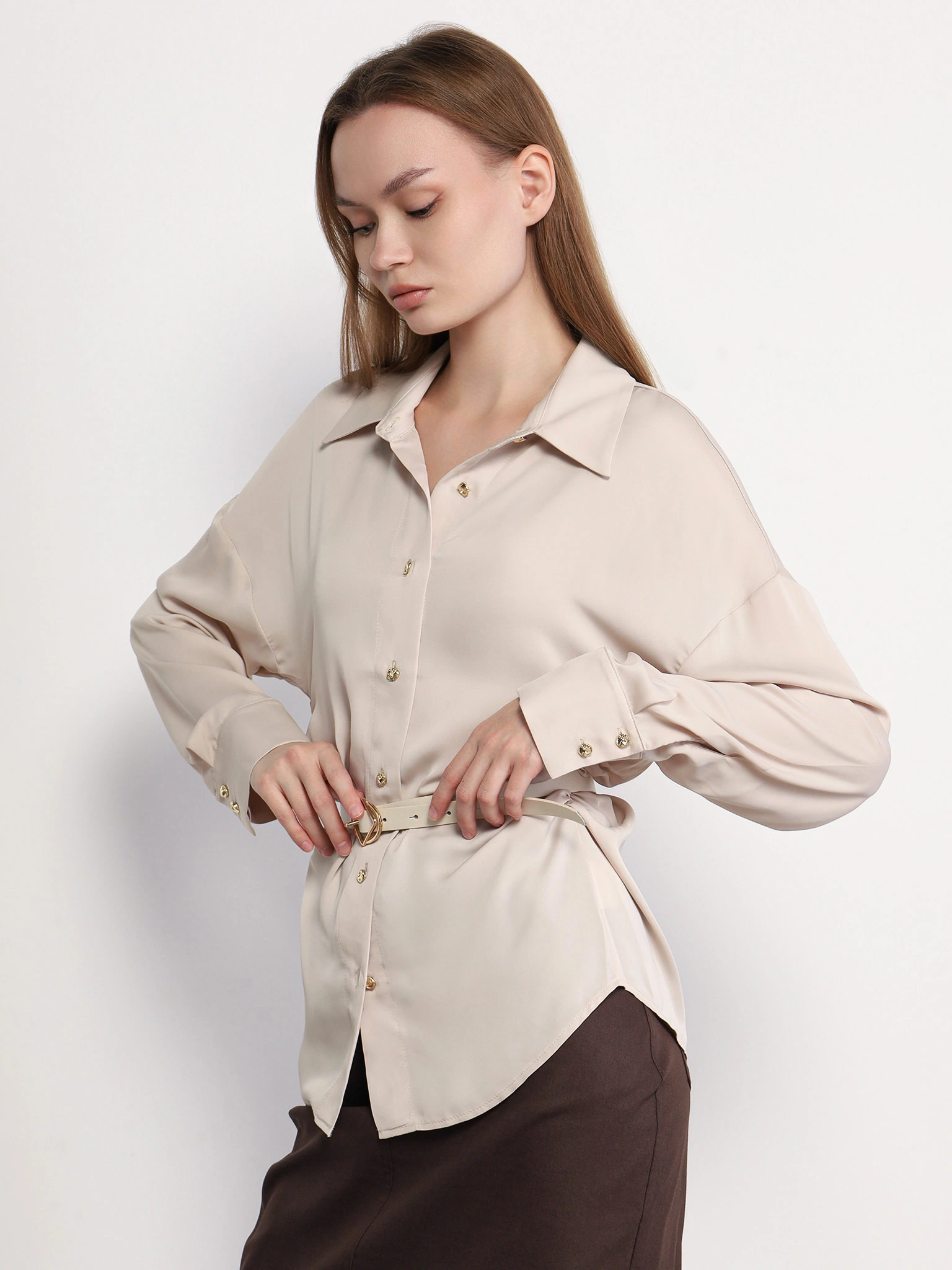 Блуза бежевого цвета с рюшами